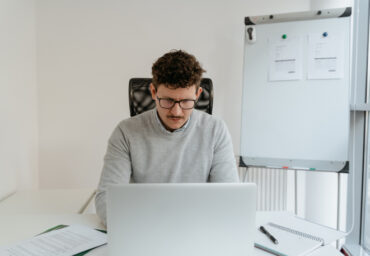 A man focusing at work