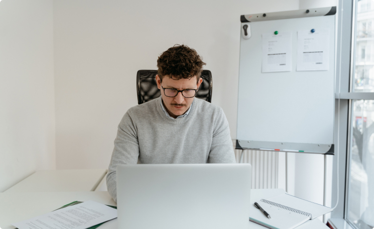 A man focusing at work